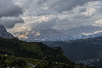 Fototapeta na wymiar Sassolungo (Langkofel) under the clouds, Dolomites, Italy