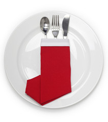 christmas dinner, table setting, napkin folded as a santa claus boots