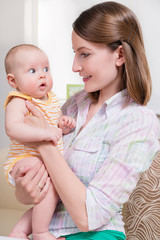 Happy mom with her baby