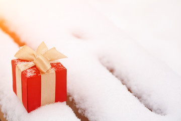 gift box in the snow outdoors