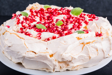 Pavlova cake with pomegranate