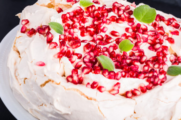 Pavlova cake with pomegranate
