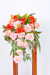 artificial flowers on wooden chair,rose