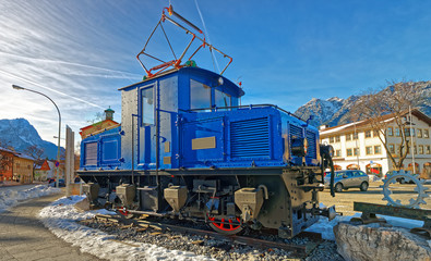Vintage steam engine locomotive train in the street of Garmisch-