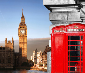 Fototapeta na wymiar London symbols with BIG BEN and red PHONE BOOTHS in England, UK