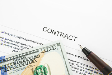 Pen on the contract papers and us dollars