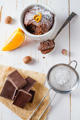 Chocolate and orange cupcake with coffee