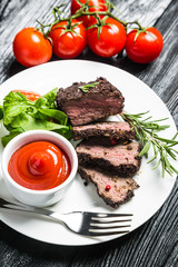 Steak with vegetables and sauce