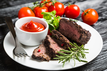 Steak with vegetables and sauce