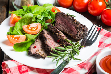 Steak with vegetables and sauce