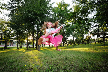 baby girl with a toy guitar