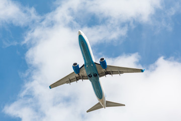 white plane takes off