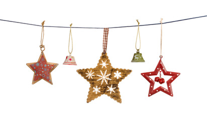 Vintage Christmas stars and bells hanging on string isolated