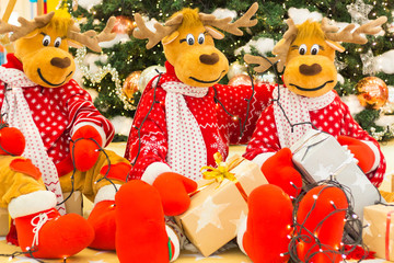 Obraz na płótnie Canvas Christmas tree, Reindeers preparing presents for Christmas
