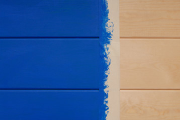 pine boards painted in blue color and sticky tape