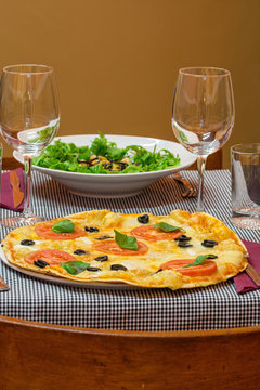  Italian table set with pizza and spaghetty plates