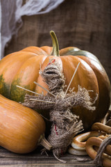 Pumpkin, gourd and voodoo doll