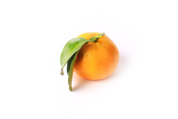 tangerine with leaves isolated on a white background