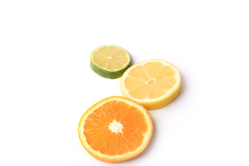 citrus orange lemon lime cut circles isolated on white background