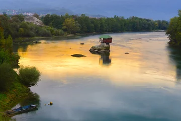 Foto auf Acrylglas Lonely house on the river Drina in Bajina Basta, Serbia © Noradoa