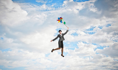 Woman flying in sky