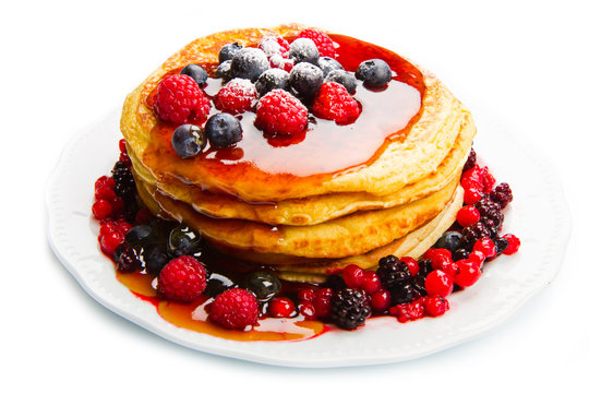 deliciuos pancake with fresh fruit on white