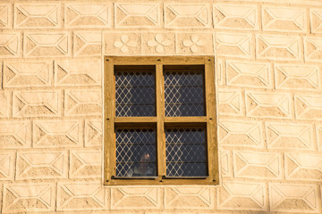 Old window with bars. Window in the castle.
