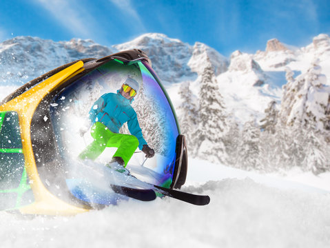 Colorful ski glasses with skier 