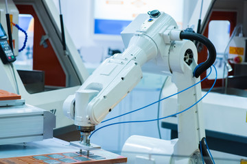 robotic hand machine tool at industrial manufacture factory