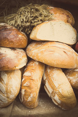 Vintage photo, Freshly baked traditional loaves of rye bread on stall
