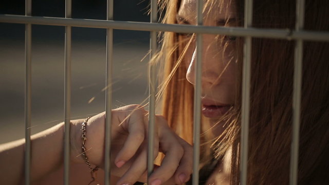 Beautiful Woman Behind Bars