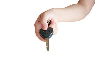 women's hand presses on the remote control car alarm systems