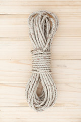 Rope on wood background