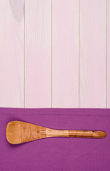 Kitchenware on purple towel