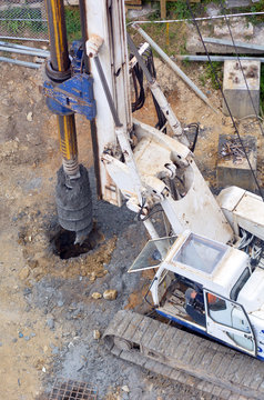 Hydraulic hammer drilling machine at construction site