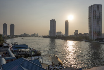 Fototapeta na wymiar People waiting a Ferry boat at Chao Phraya River, Chao Phraya River is a major river in Thailand,more ferry boat for transport service.on january 5, 2015 in Bangkok, Thailand