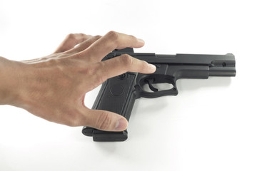 hand holding a handgun