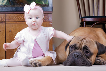  little girl and a huge dog. friends
