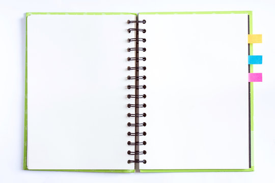 opened notebook with blank paper pages and color bookmarks
