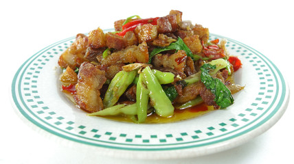 Rice topped with stir-fried crispy pork and basin