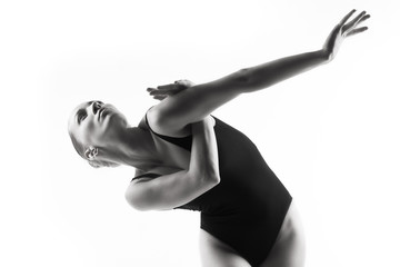 Naklejka premium Modern ballet dancer posing on white background