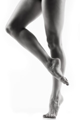 Ballet dancer legs over white