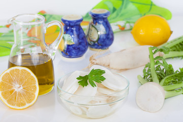 White radish salad with lemon and olive oil