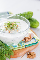 Tarator ingredients on white wood background