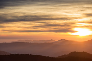 sunset over fog in Black Forest, Germany