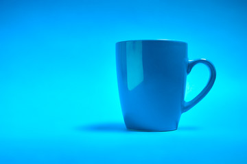 cup of coffee on a blue background