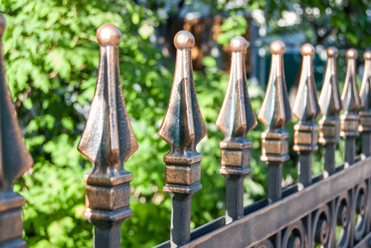 Forge Detail. Part Of Iron Gate Details. Fragment Forged Fence On Outdoor