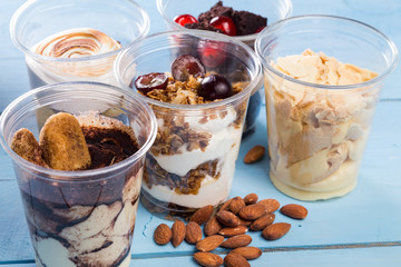 Creamy dessert in plastic cup