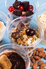 Creamy dessert in plastic cup