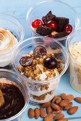 Creamy dessert in plastic cup